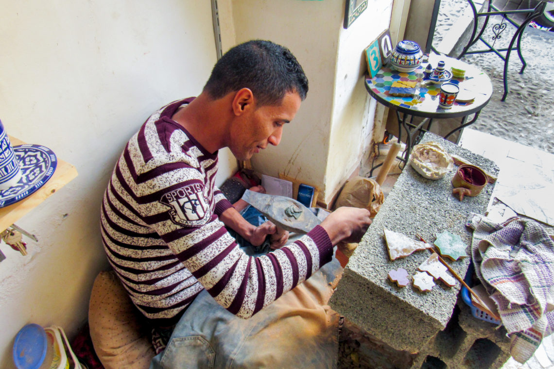 Driss making zellij tile.