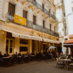 Café Tingis to the left and Café Central to the right.